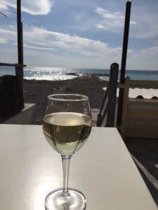 Enjoy a drink the local white wine of the italian coast and san Remo